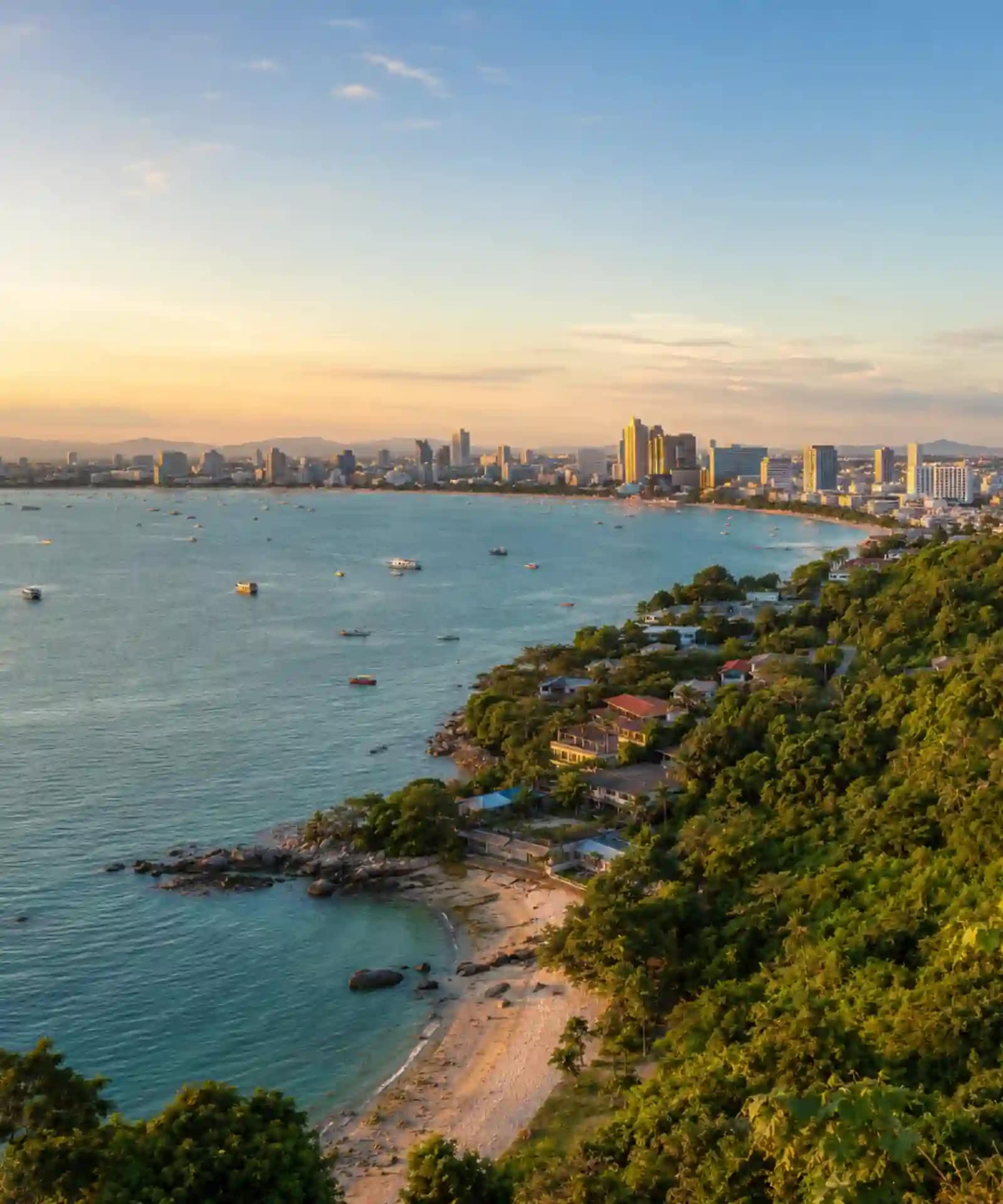 Pratumnak Hill or Central Pattaya: Where Should You Stay? 1 View across Pattaya Bay showing green Pratumnak Hill and the Central Pattaya skyline