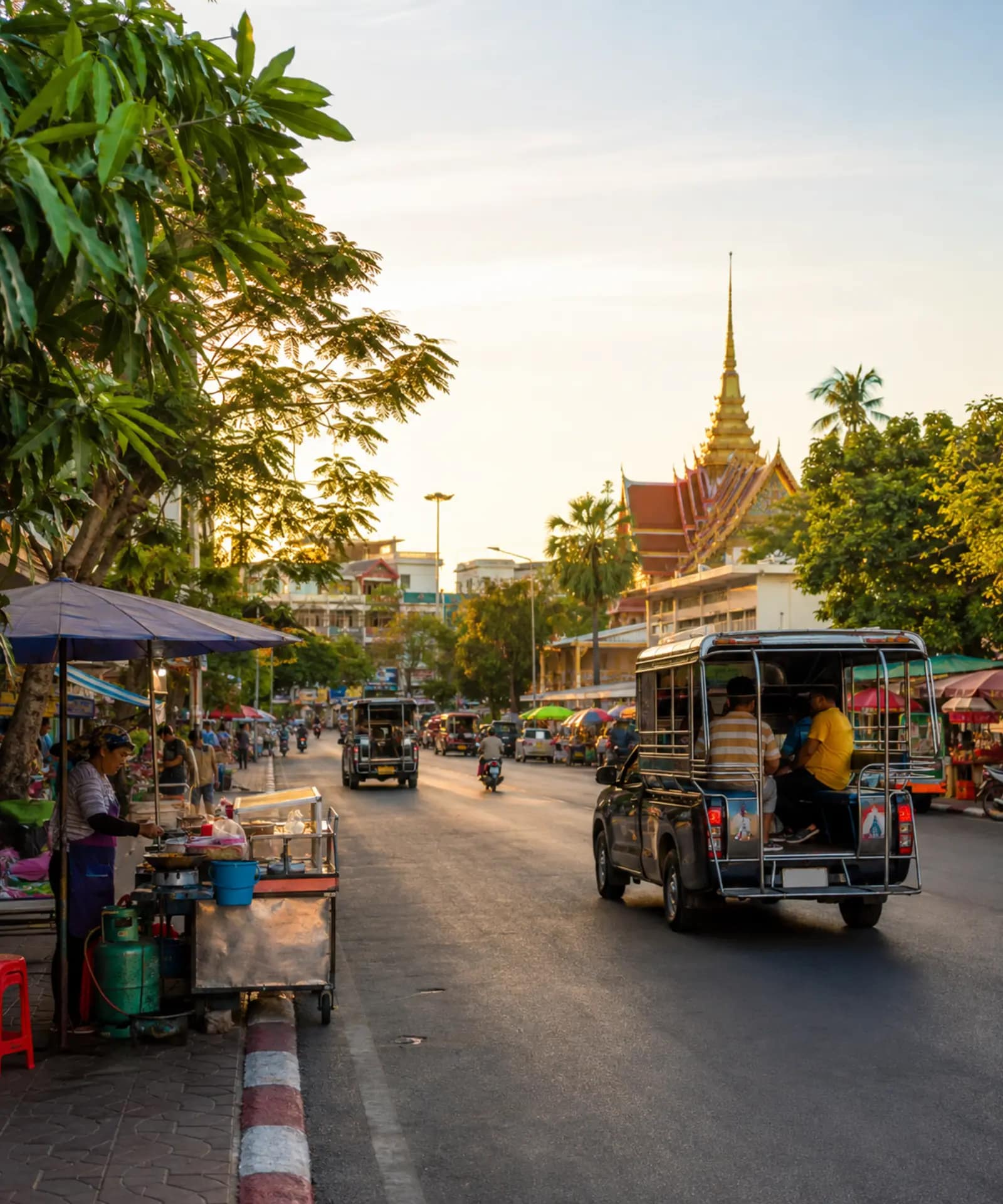 South Pattaya Road, Thailand: Interesting Things to Know 1 South Pattaya Road in Thailand with a songthaew, street food stalls and a Buddhist temple