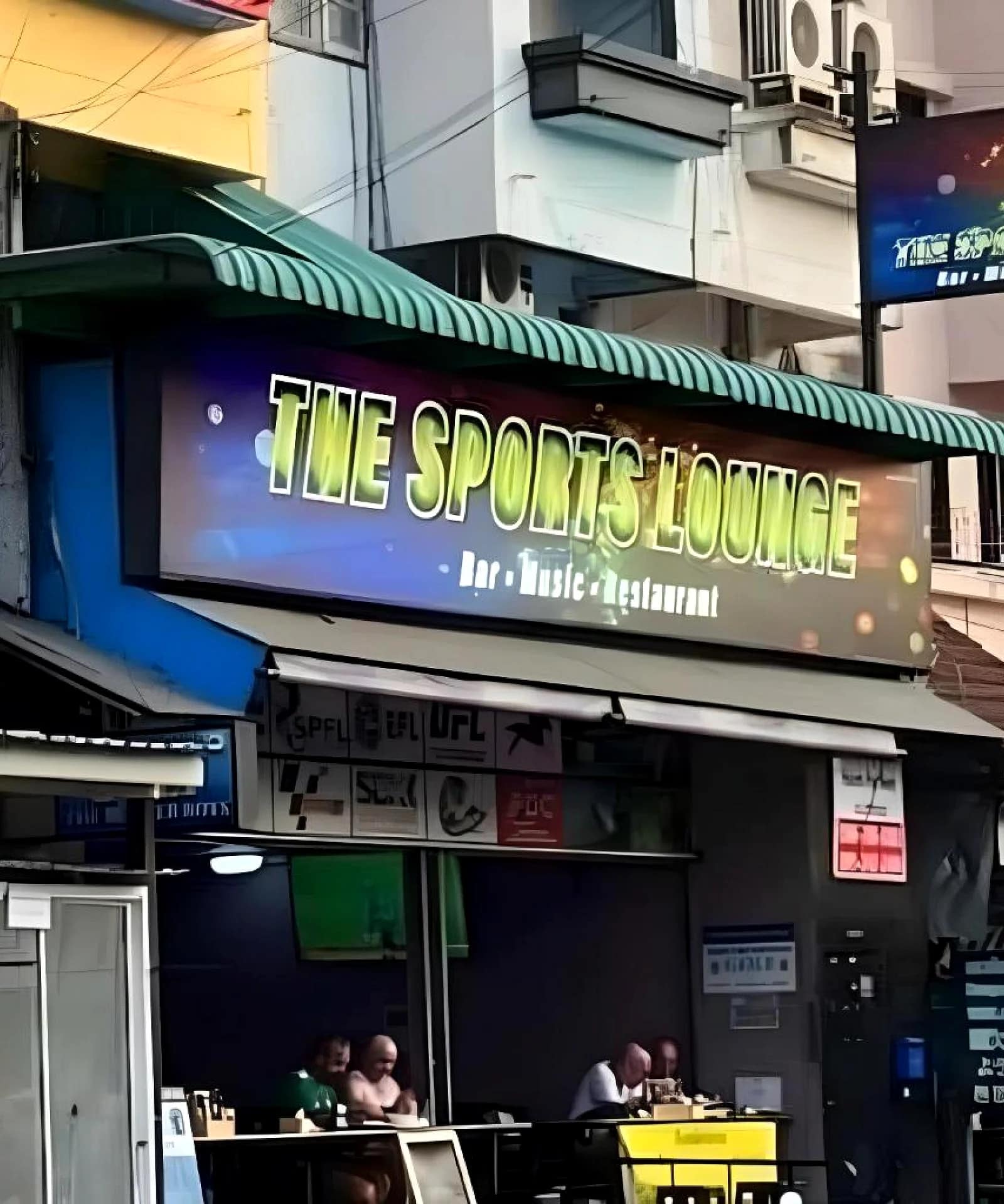 The Sports Lounge Pattaya Review: Great Value or One to Avoid? 1 Lively evening street scene in central Pattaya near Soi Buakhao