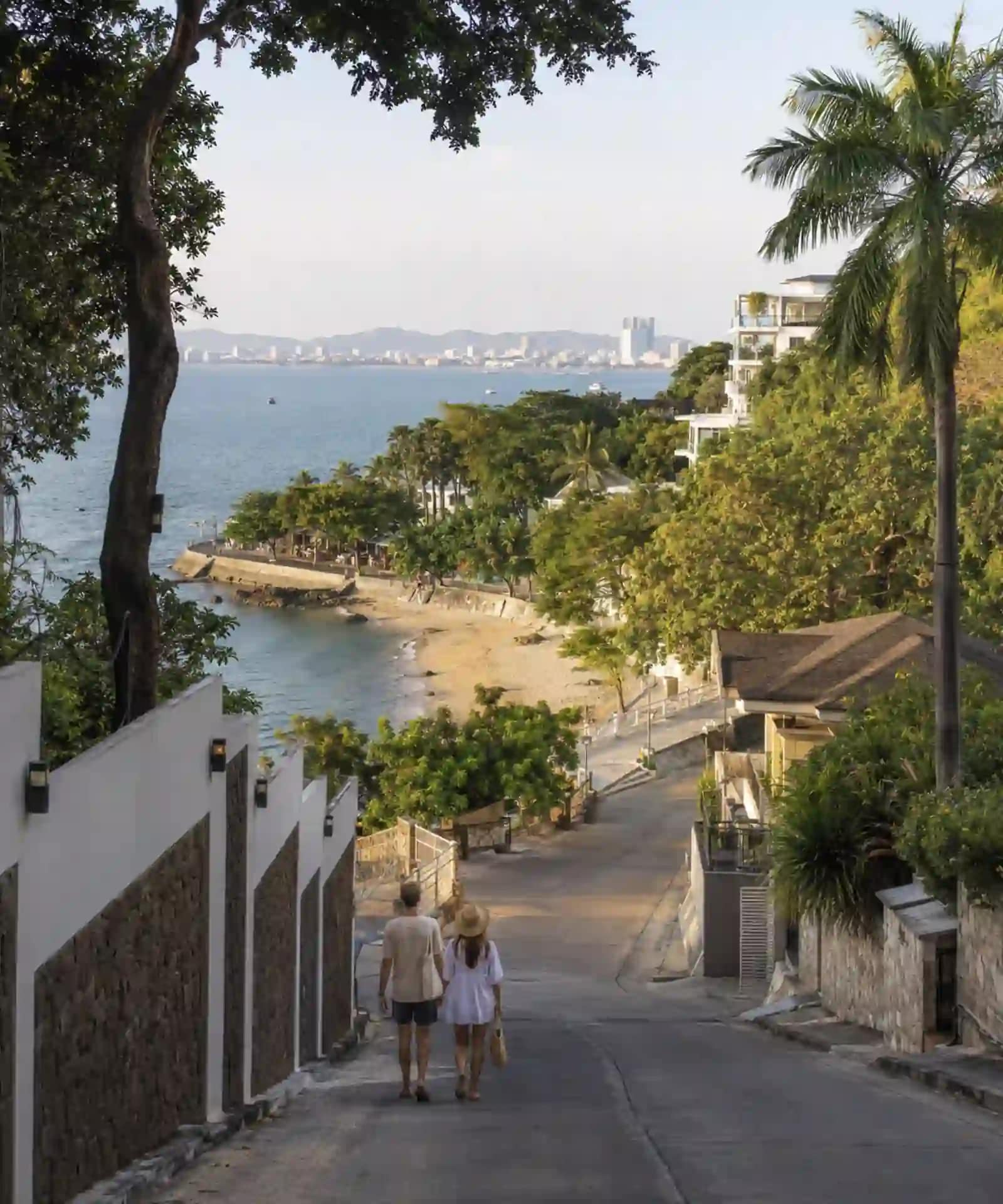 Pratumnak Hill or Central Pattaya: Where Should You Stay? 3 Quiet leafy street descending towards a small beach on Pratumnak Hill